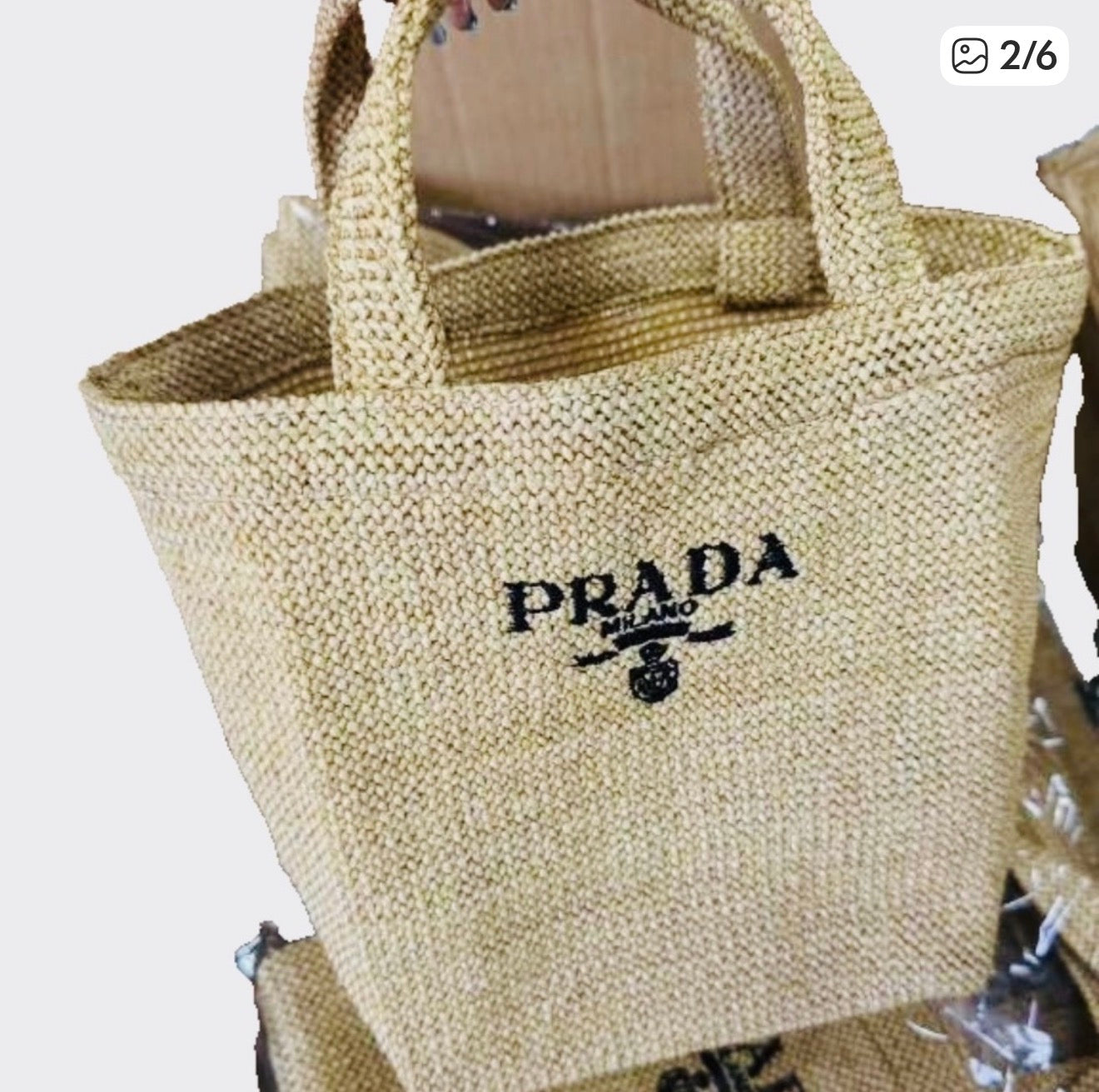 Prada tan woven bag small